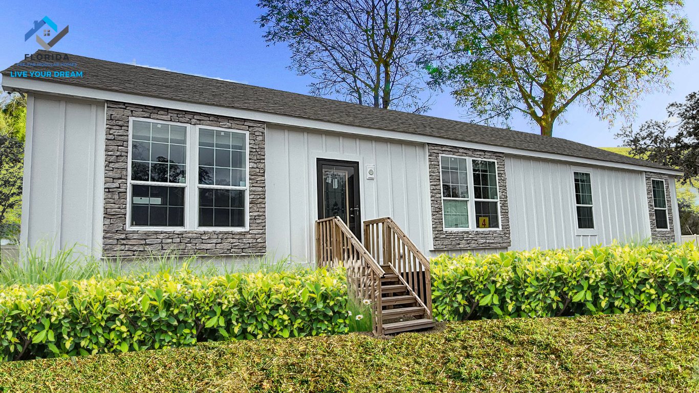 The Brantley model home exterior with board-and-batten siding and stone accents, Florida Prefab Modular Homes in Ocala